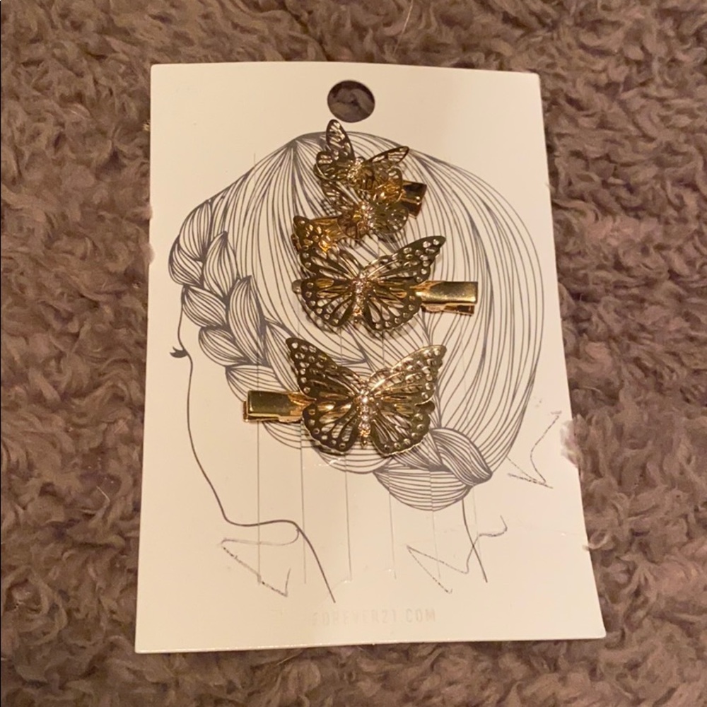 Gold butterfly hair clips
